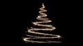 The image features a lone Christmas tree, its branches sparkling, topped with a star, and positioned on a plain black Royalty Free Stock Photo