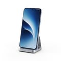 Smartphone on charging stand isolated on white background Royalty Free Stock Photo