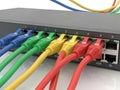 Network switch with colorful cables isolated on white background Royalty Free Stock Photo