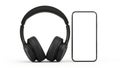 Black headphones beside smartphone isolated on white background Royalty Free Stock Photo
