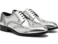 Silver brogue shoes isolated on white background Royalty Free Stock Photo