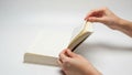 Hands holding open book, isolated on white background Royalty Free Stock Photo