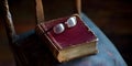 Glasses and book on vintage surface Royalty Free Stock Photo