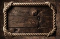 A rustic wooden signboard framed with thick rope on dark wooden background Royalty Free Stock Photo