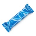 A vibrant blue candy bar with a shiny wrapper resting on a white background Royalty Free Stock Photo