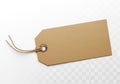 A simple brown paper tag with twine hanging against a light background Royalty Free Stock Photo