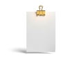 Blank paper with gold clip isolated on white background Royalty Free Stock Photo