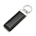 Black leather keychain with metal ring isolated on white background Royalty Free Stock Photo