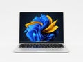 Modern laptop with abstract design on screen isolated on white background Royalty Free Stock Photo