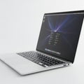 Modern laptop displaying code on screen Royalty Free Stock Photo