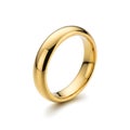 Elegant gold band ring displayed against a plain background for a minimalist aesthetic Royalty Free Stock Photo