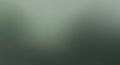 Softly Blended Green and Grey Abstract Gradient Background with Subtle Light Diffusion AI Generated Royalty Free Stock Photo