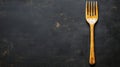 The image features a solitary, ornate silver fork positioned on a clean white background, suitable for use in cooking Royalty Free Stock Photo