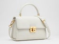 Elegant white leather handbag with gold accents Royalty Free Stock Photo