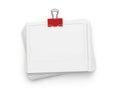 Stack of papers with red clip, isolated on white background Royalty Free Stock Photo