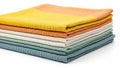 Stack of colorful fabrics isolated on white background Royalty Free Stock Photo