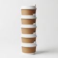Stack of disposable coffee cups isolated on white background Royalty Free Stock Photo