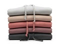 Stack of folded fabrics isolated on white background Royalty Free Stock Photo