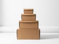 Stack of cardboard boxes isolated on white background Royalty Free Stock Photo