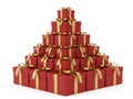 Stack of red gift boxes with golden ribbons, isolated on white background Royalty Free Stock Photo