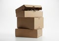 Stack of three brown cardboard boxes isolated on white background Royalty Free Stock Photo