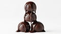 Stack of chocolate truffles isolated on white background Royalty Free Stock Photo