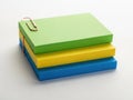 Stack of colorful notepads isolated on white background Royalty Free Stock Photo