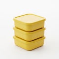 Stack of yellow containers isolated on white background Royalty Free Stock Photo