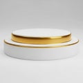 Stacked circular objects with gold trim isolated on white background Royalty Free Stock Photo