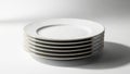 Stack of white ceramic plates isolated on white background Royalty Free Stock Photo