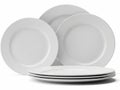 Stack of white dinner plates isolated on white background Royalty Free Stock Photo