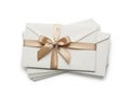 Stack of envelopes with ribbon isolated on white background Royalty Free Stock Photo
