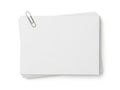Stack of white papers with paperclip, isolated on white background Royalty Free Stock Photo
