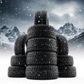 Stack of winter tires isolated on white background Royalty Free Stock Photo