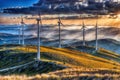 Mountain Sunset & Wind Turbines: Glowing Cloudscape, generative ai Royalty Free Stock Photo