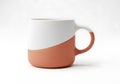 Modern ceramic coffee mug in white and terracotta isolated on white background Royalty Free Stock Photo