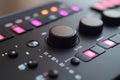 Close up of modern control panel showing colorful buttons and knobs. This image captures the essence of creativity and Royalty Free Stock Photo