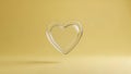 Silver Heart on Yellow Background Royalty Free Stock Photo