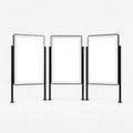 Three modern black metal frames standing upright in a row against a white background Royalty Free Stock Photo