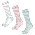 Set of three colorful striped socks isolated on a white background perfect for casual wear and everyday use Royalty Free Stock Photo
