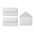 Three white envelopes with flaps facing different directions on white background Royalty Free Stock Photo