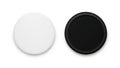 Two circular objects, one white and one black, isolated on white background Royalty Free Stock Photo