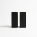Two black rectangular objects side by side Royalty Free Stock Photo