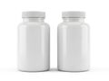 Two identical white plastic bottles standing side by side Royalty Free Stock Photo