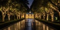 lit mansion. row of lights. wet floor reflections. Road, driveway, boulevard, byway, route, track, trail, street, row of trees. Royalty Free Stock Photo
