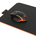 Wireless gaming mouse on mousepad isolated on white background Royalty Free Stock Photo