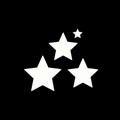 Three stars on black background Royalty Free Stock Photo