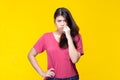 Image of feeling excited, shock, surprise and happy. Young asian woman standing on yellow background. Female face expressions and