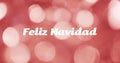 Image of feliz navidad text over red spots of light background Royalty Free Stock Photo