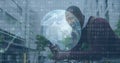 Image of financial data processing, binary coding and globe over man using smartphone Royalty Free Stock Photo
